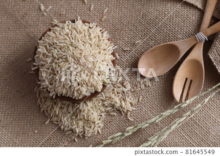 Organic raw brown rice in close up Organic raw brown rice in close up 81645549