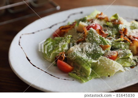 caesar salad appetizer on wooden background caesar salad appetizer on wooden background 81645830