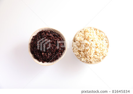 Organic boiled brown rice on bowl isolated in white background Organic boiled brown rice on bowl isolated in white background 81645834
