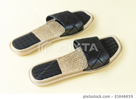 Pair of woman black beach sandals or slippers Pair of woman black beach sandals or slippers 81646659