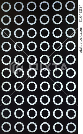 Photo of graphics, white circles on black background 81648854