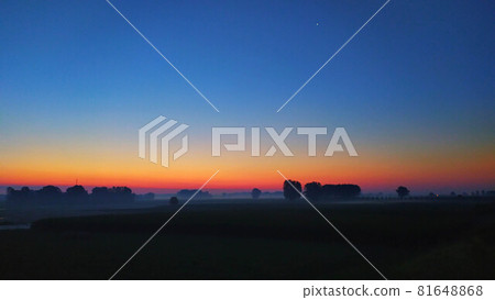 Sunset on the Padana plain near the Po river, Italy 81648868
