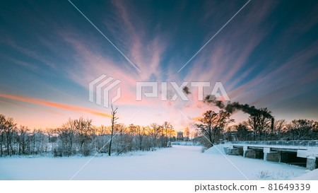 Dobrush, Gomel Region, Belarus. Panorama Of Old Paper Factory Tower At Winter Evening Or Night. Historical Heritage. Lunacharsky Avenue. 81649339