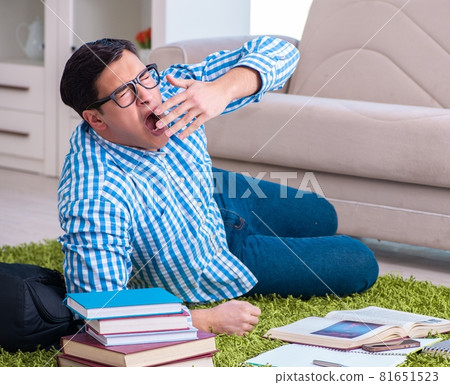 Young student preparing for exams at home 81651523