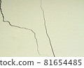 Cracked concrete texture closeup background 81654485