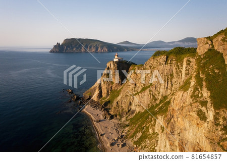 Lighthouse Baluzek on the coast of the Sea of Japan Lighthouse Baluzek on the coast of the Sea of Japan 81654857