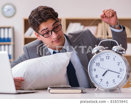 Tired man sleeping at home having too much work 81655641