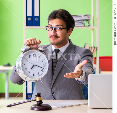 Young handsome lawyer working in the office Young handsome lawyer working in the office 81655707