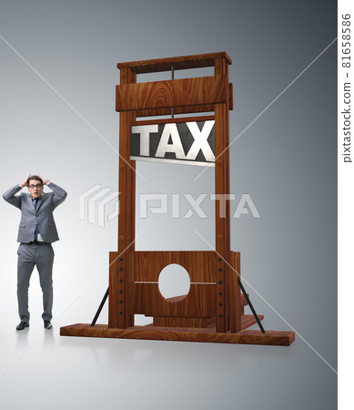 Businessman in heavy high taxes business concept 81658586