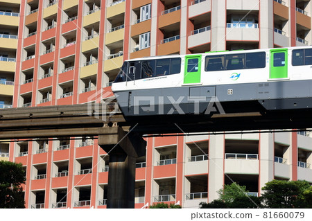 Tokyo Monorail Train passing by Shibaura Island in Minato-ku Tokyo Japan, traveling from Haneda Airport to Hamamatsu-cho. Tokyo Monorail Train passing by Shibaura Island in Minato-ku Tokyo Japan, traveling from Haneda Airport to Hamamatsu-cho. 81660079