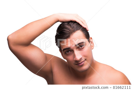 Man doing his hair isolated on white 81662111