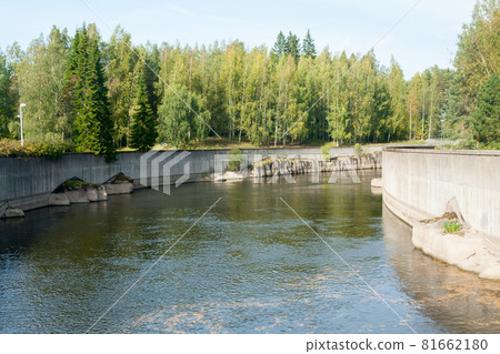 KOUVOLA, FINLAND - SEPTEMBER 20, 2018: Hydroelectric power generation plant and Ankkapurha Industrial Museum at Kymijoki river, Finland KOUVOLA, FINLAND - SEPTEMBER 20, 2018: Hydroelectric power generation plant and Ankkapurha Industrial Museum at Kymijoki river, Finland 81662180