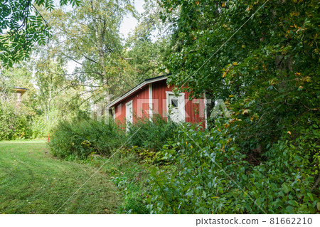 KOUVOLA, FINLAND - SEPTEMBER 20, 2018: Beautiful red old wooden house on the territory of Anjala manor. 81662210