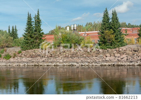 KOUVOLA, FINLAND - SEPTEMBER 20, 2018: Hydroelectric power generation plant and Ankkapurha Industrial Museum at Kymijoki river, Finland KOUVOLA, FINLAND - SEPTEMBER 20, 2018: Hydroelectric power generation plant and Ankkapurha Industrial Museum at Kymijoki river, Finland 81662213