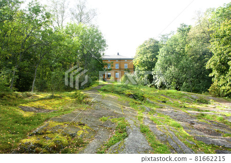 KOUVOLA, FINLAND - SEPTEMBER 20, 2018: Beautiful yellow old building of abandoned Anjala manor. The building was built at the turn of the 19th century and belonged to the Wrede family from 1837 KOUVOLA, FINLAND - SEPTEMBER 20, 2018: Beautiful yellow old building of abandoned Anjala manor. The building was built at the turn of the 19th century and belonged to the Wrede family from 1837 81662215