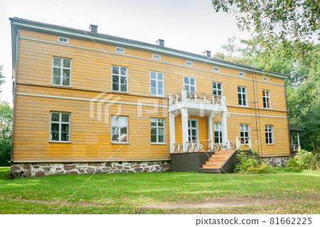KOUVOLA, FINLAND - SEPTEMBER 20, 2018: Beautiful yellow old building of abandoned Anjala manor. The building was built at the turn of the 19th century and belonged to the Wrede family from 1837 KOUVOLA, FINLAND - SEPTEMBER 20, 2018: Beautiful yellow old building of abandoned Anjala manor. The building was built at the turn of the 19th century and belonged to the Wrede family from 1837 81662225