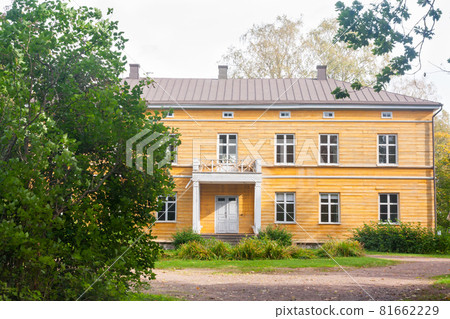 KOUVOLA, FINLAND - SEPTEMBER 20, 2018: Beautiful yellow old building of abandoned Anjala manor. The building was built at the turn of the 19th century and belonged to the Wrede family from 1837 KOUVOLA, FINLAND - SEPTEMBER 20, 2018: Beautiful yellow old building of abandoned Anjala manor. The building was built at the turn of the 19th century and belonged to the Wrede family from 1837 81662229