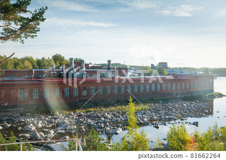 KOUVOLA, FINLAND - SEPTEMBER 20, 2018: Hydroelectric power generation plant and Ankkapurha Industrial Museum at Kymijoki river, Finland 81662264