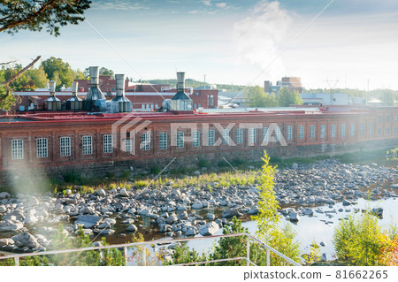 KOUVOLA, FINLAND - SEPTEMBER 20, 2018: Hydroelectric power generation plant and Ankkapurha Industrial Museum at Kymijoki river, Finland 81662265