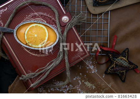 Orange cheese cake on beautiful background. One piece. Orange cheese cake on beautiful background. One piece. 81663428