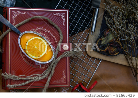 Orange cheese cake on beautiful background. One piece. Orange cheese cake on beautiful background. One piece. 81663429