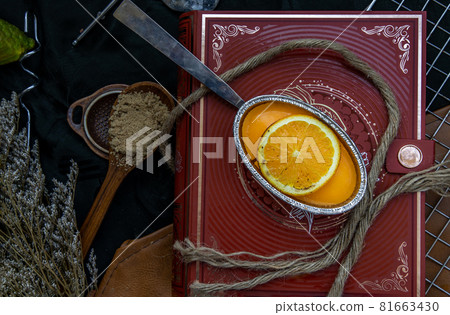 Orange cheese cake on beautiful background. One piece. 81663430