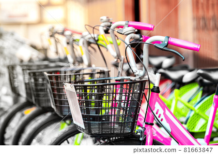 close up of bicycle in a row with basket on vintage and classic bicycle at shop for rental and sale for cycling for travel and exercise in urban town 81663847
