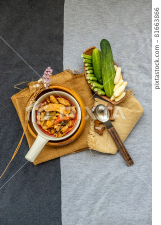 Panaeng Curry with Pork menu with Coconut milk Served with vegetable. Panaeng Curry with Pork menu with Coconut milk Served with vegetable. 81663866