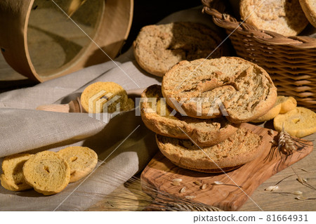 Italian appetizer Friselle. Apulian dried bread Friselle in wooden background 81664931