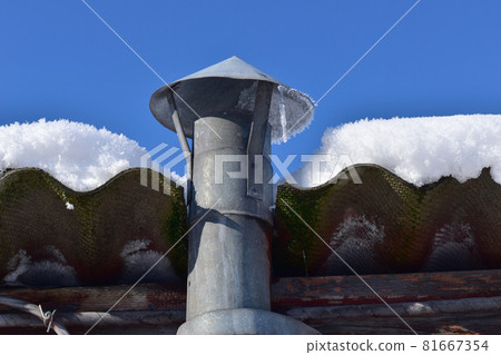 Chimney on the roof covered with snow. Chimney on the roof covered with snow. 81667354
