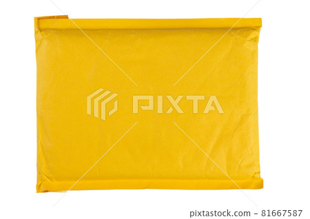 Yellow paper bag on a white background. Packaging for international deliveries. Yellow paper bag on a white background. Packaging for international deliveries. 81667587