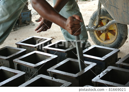 MALACCA, MALAYSIA -MAY 18, 2016: Cube test. Steel mold in square shape used to get standard square shape concrete block. The concrete block will be used for compression test in laboratory. MALACCA, MALAYSIA -MAY 18, 2016: Cube test. Steel mold in square shape used to get standard square shape concrete block. The concrete block will be used for compression test in laboratory. 81669021