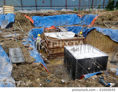 SELANGOR, MALAYSIA -JULY 14, 2016: The concrete pile cap concreted at the construction site in Selangor Malaysia. The pile cap is the part of building foundation.  81669049