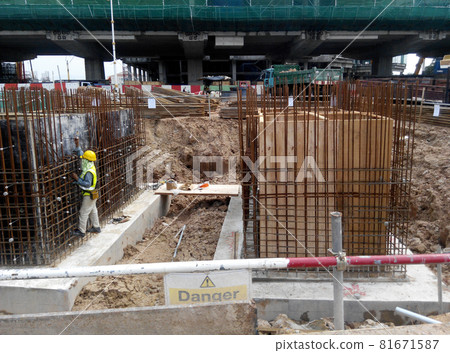 JOHOR, MALAYSIA -DECEMBER 9, 2015: Pile cap reinforcement bar fabricated by construction workers at the construction site in Johor, Malaysia. 81671587