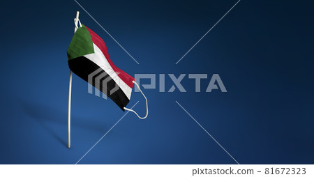Sudan mask on dark blue background. Waving flag of Sudan painted on medical mask on pole. Concept of The banner of the fight against the epidemic coronavirus COVID-19 81672323