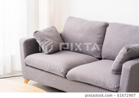 A bright living room sofa with sunshine A bright living room sofa with sunshine 81672907