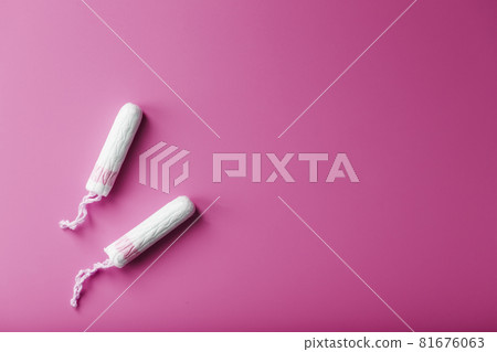 Gynecological tampons on a pink background free space 81676063
