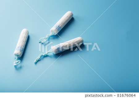 Gynecological tampons on a blue background top view 81676064