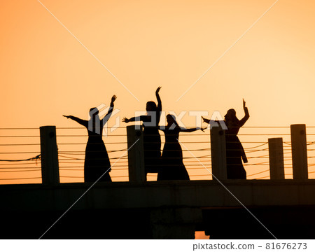 Georgian dancing on the pier in sunset Georgian dancing on the pier in sunset 81676273