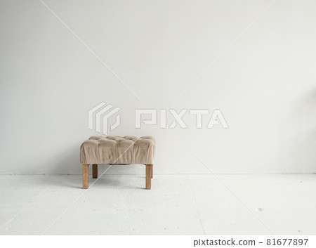 Stylish armchair near wall Stylish armchair near wall 81677897