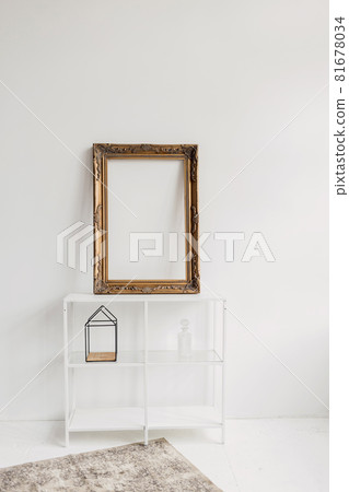 bookshelf and a picture frame 81678034