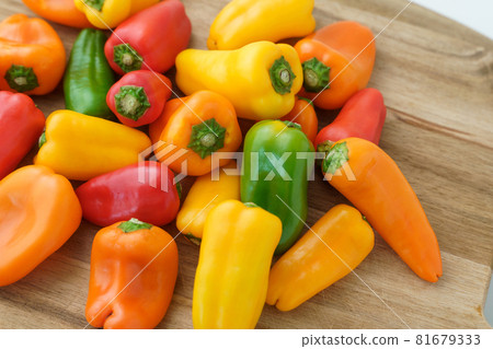 Color peppers white background Color peppers white background 81679333