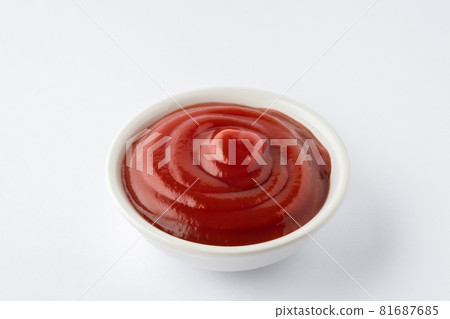 Tomato ketchup in ceramic bowl on white background. 81687685