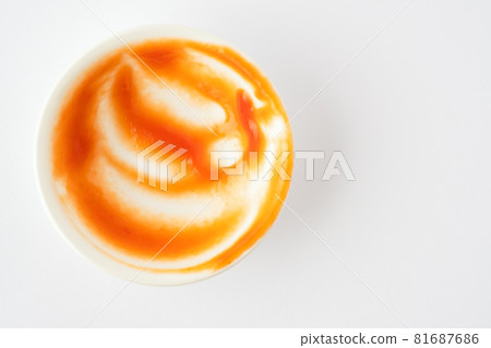 Tomato ketchup in ceramic bowl on white background. Tomato ketchup in ceramic bowl on white background. 81687686