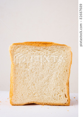Slice of bread on the white background. Slice of bread on the white background. 81687689