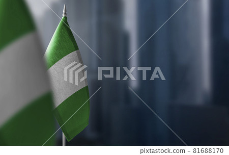 Small flags of Nigeria on a blurry background of the city Small flags of Nigeria on a blurry background of the city 81688170