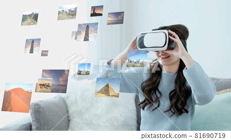 A woman enjoying a trip in VR 81690719
