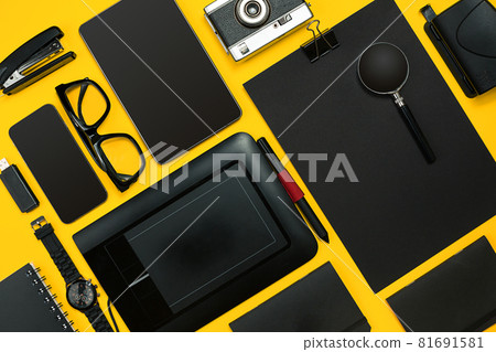 Workplace with office items and business elements on a desk. Con 81691581