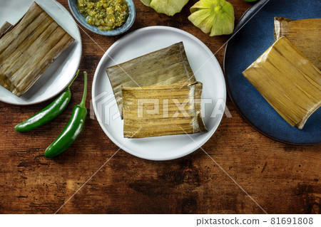 Tamales oaxaquenos, traditional dish of the cuisine of Mexico Tamales oaxaquenos, traditional dish of the cuisine of Mexico 81691808