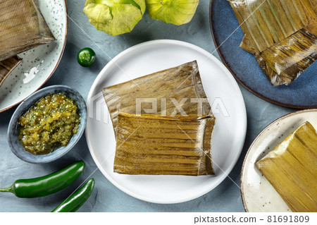 Tamales oaxaquenos, traditional dish of the cuisine of Mexico Tamales oaxaquenos, traditional dish of the cuisine of Mexico 81691809